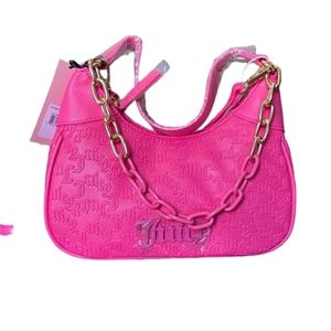 Juicy Couture can't tame her shoulder bag